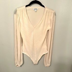 Express size small v neck ribbed bodysuit cream color with some gold